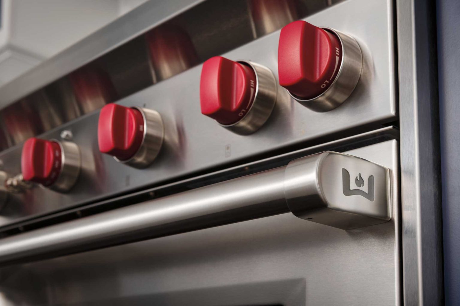 close up view of the knobs of a wolf oven